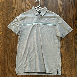 Dark grey Travis Matthew’s golf polo